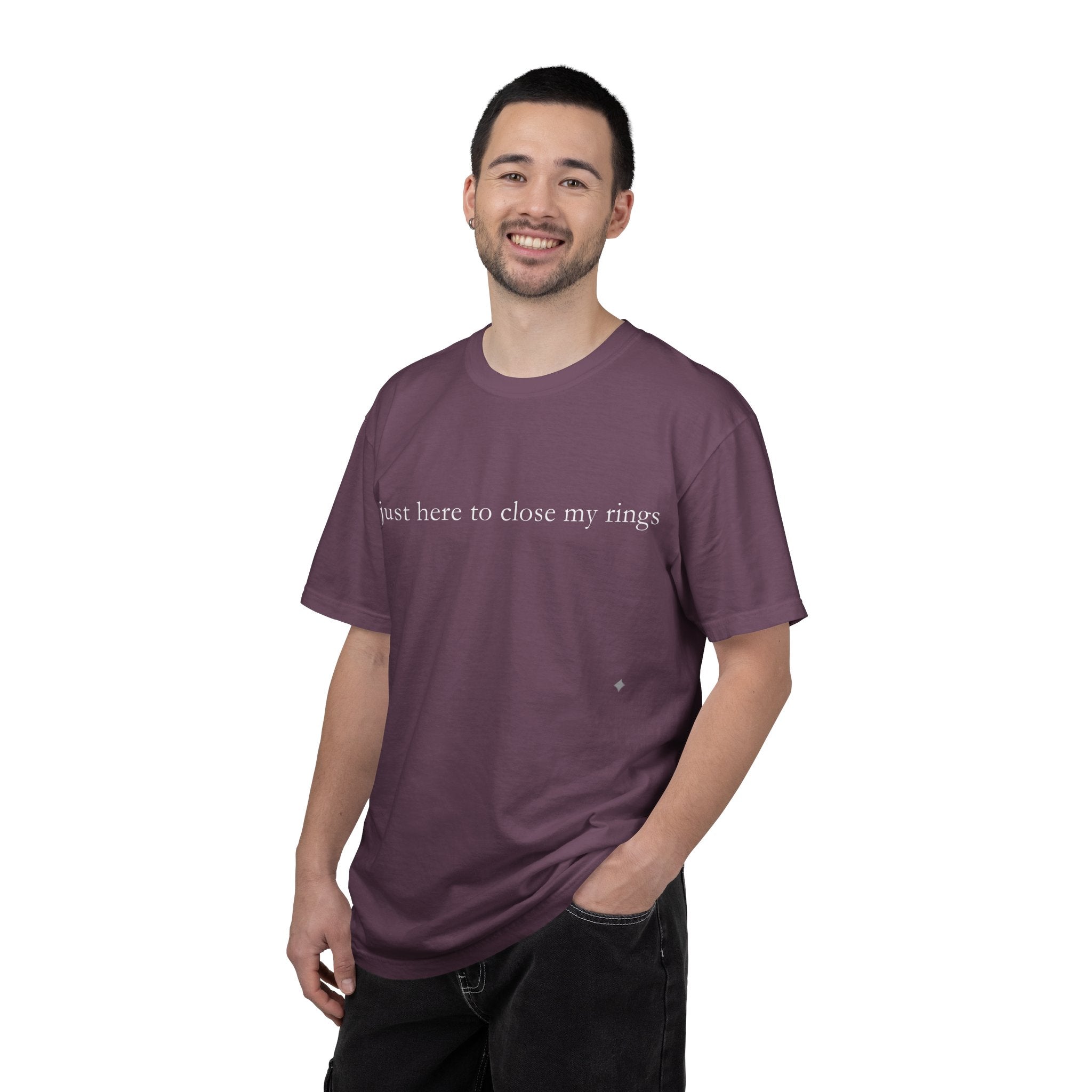Man wearing a purple t-shirt with text on a white background