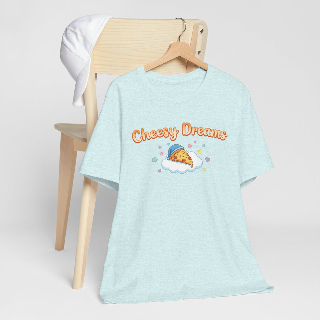 Light blue t-shirt with 'Cheesy Dreams' and pizza graphic on a chair against a white background