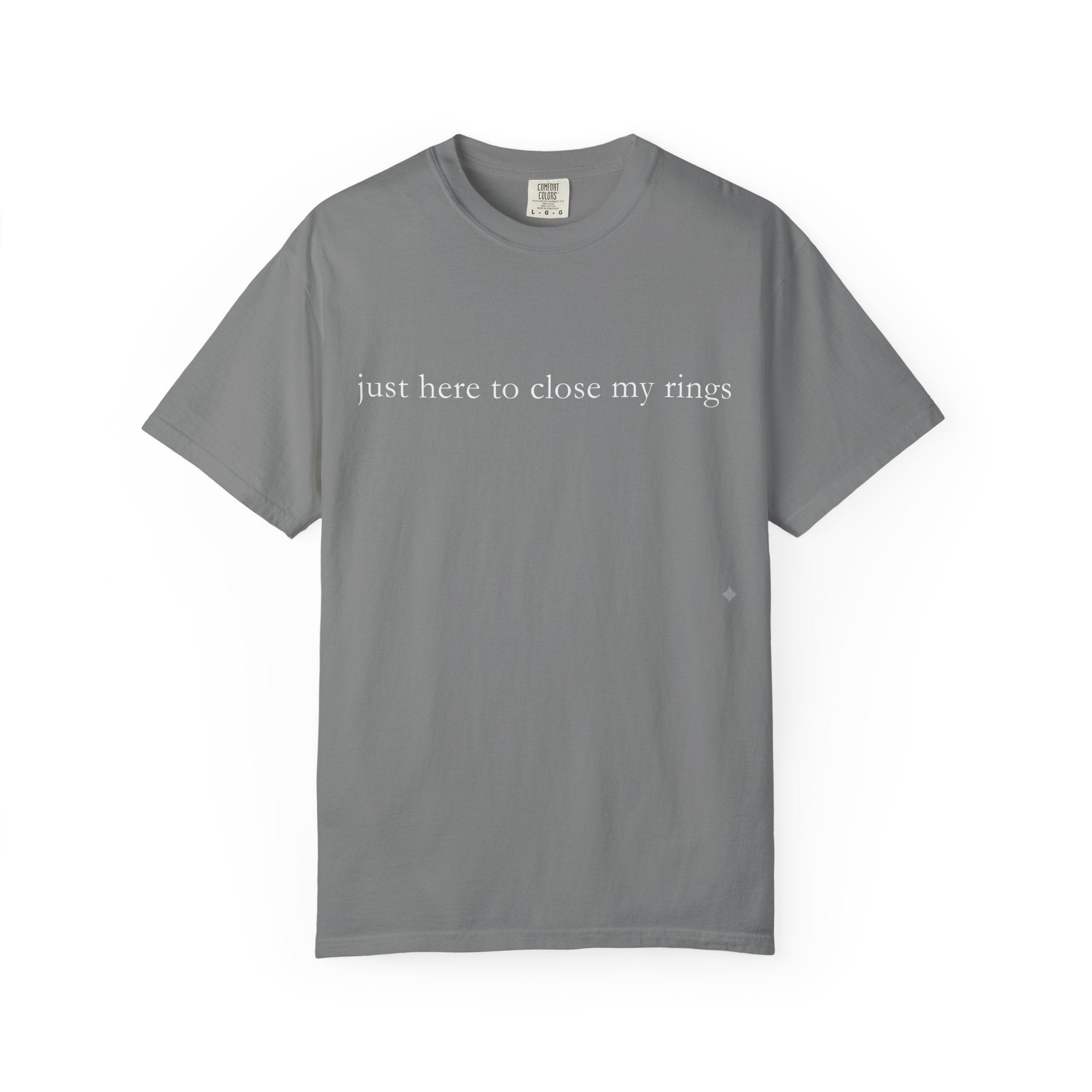 Gray t-shirt with text 'just here to close my rings' on a white background